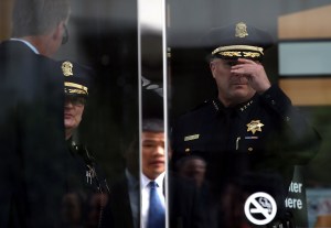 San Francisco police chief Greg Suhr (R) arrives at a news conference on June 3, 2014, in San Francisco. (Credit: Justin Sullivan/Getty Images)