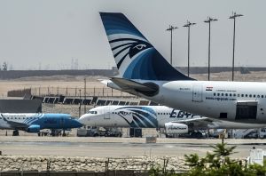 EgyptAir planes are seen on the tarmac at Cairo international airport on May 19, 2016, after an EgyptAir flight from Paris to Cairo crashed into the Mediterranean on with 66 people on board, prompting an investigation into whether it was mechanical failure or a bomb. (Credit: KHALED DESOUKI/AFP/Getty Images)