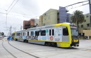 During the opening of the Metro Expo Line extension, a train passes between Culver City and Santa Monica station on May 20, 2016. (Credit: FREDERIC J. BROWN/AFP/Getty Images)