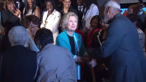 Hillary Clinton shakes hands at the California African American Museum on May 5, 2016. (Credit: KTLA)