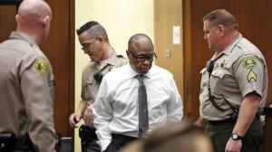 Lonnie Franklin Jr. enters the courtroom early in his 2016 murder trial. Franklin is charged with the so-called Grim Sleeper killings that terrorized South L.A. over more than two decades. (Credit: Al Seib / Los Angeles Times)