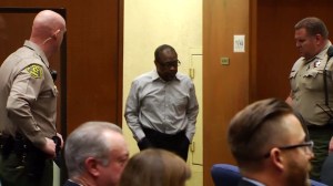 Lonnie Franklin Jr. enters the courtroom before the verdict is read in his murder trial on May 5, 2016. (Credit: pool)
