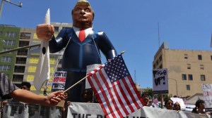 A blow up figure of Donald Trump is seen at a May Day event in downtown L.A. on May 1, 2016. (Credit: Rick Loomis / Los Angeles Times) 