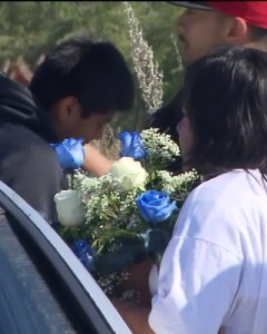 Classmates and family members gathered at the L.A. River to remember Carlos Jovel, 16, and Gustavo Ramirez, 15, on May 2, 2016. (Credit: KTLA)