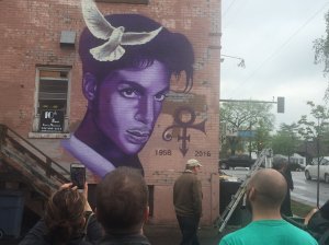 A mural celebrating Prince's life in the Uptown neighborhood he made famous singing about. (Credit: CNN)