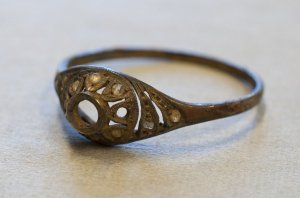 A mug confiscated by Nazis at Auschwitz has been hiding a secret for more than 70 years. Workers at the Auschwitz Museum this week found a gold ring and necklace that had been carefully wrapped in canvas before being concealed in a false base. (Credit: Auschwitz Museum)