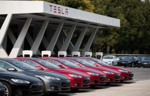 Tesla Model S vehicles are parked outside a car dealership in Shanghai on March 17, 2015. (Credit: JOHANNES EISELE/AFP/Getty Images)