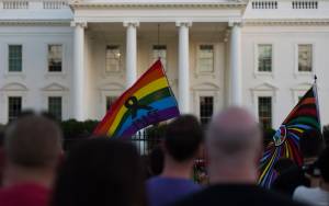 People hold a vigil in front of the White House in Washington, D.C., on June 12, 2016, in reaction to the mass shooting at a gay nightclub in Orlando, Florida. (Credit: Andrew Caballero-Reynolds/AFP/Getty Images)