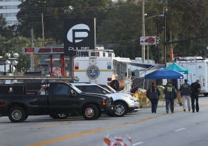 Law enforcement officials on June 15, 2016, continue to investigate the Pulse gay nightclub where Omar Mateen killed 49 people in Orlando, Florida. (Credit: Joe Raedle/Getty Images)