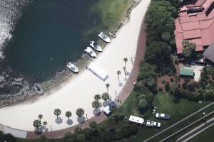 Search and rescue boats are seen on a beach near the Walt Disney World's Grand Floridian resort hotel where a 2-year-old boy was taken by an alligator as he waded in the waters of the Seven Seas Lagoon on June 15, 2016. (Credit: Joe Raedle/Getty Images)