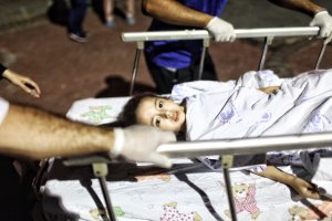 A wounded girl from the Ataturk Airport suicide bomb attack is carried to the Bakirkoy Sadi Konuk Hospital, in the early hours of June 29, 2016 in Istanbul, Turkey. (Credit: Defne Karadeniz/Getty Images)