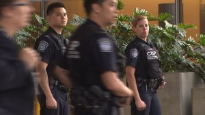 Federal officers stand at Los Angeles International Airport on June 28, 2016, when a deadly suicide bombing occurred at Istanbul's airport. (Credit: KTLA)
