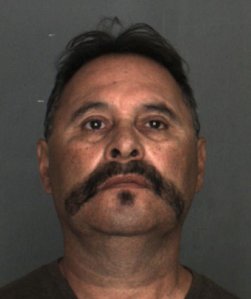 Mario Anthony Hernandez is seen in a booking photo released by the San Bernardino County District Attorney's Office. 