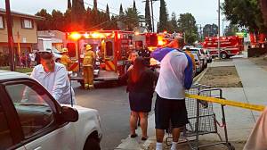 A witness provided this photo of firefighter-paramedics and police at the scene of a murder-suicide shooting in Panorama City on June 11, 2016.
