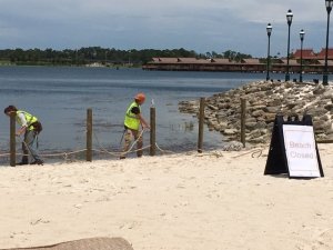 Ropes were being put up near waterways near Disney resorts on June 17, 2016, after a 2-year-old boy was snatched by an alligator and then drowned. (Credit: CNN)