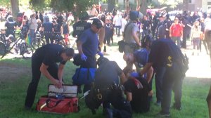 Several people were taken to hospitals on June 26, 2016 after violence broke out between a white supremacist group and counter-protesters. (Credit: CNN via KTXL)