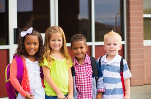 Kindergarten age kids are seen standing in front of their school in this file photo. (Credit: Thinkstock by Getty Images)