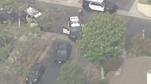 A vehicle stopped in Hancock Park took off, crashing into a deputy's SUV on June 28, 2016. (Credit: KTLA)