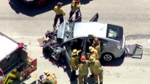 A Toyota Prius involved in a crash on the southbound 5 Freeway north of Pyramid Lake was left totaled on July 13, 2016. (Credit: KTLA)