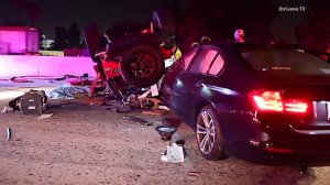 A man and two young children died after their Jeep overturned on the westbound 91 Freeway in Artesia on July 9, 2016. (Credit: KTLA) 
