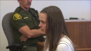 Jessicah Cowan reads a statement at her sentencing hearing in Santa Ana on July 15, 2016. (Credit: KTLA)