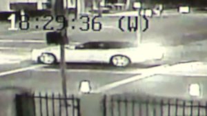 LAPD officials are looking for a Camaro with a black top in connection with the fatal shooting of Garrick Thomas in January.
