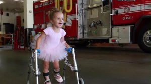 Finley Smallwood appears in a still from a "Dare to Dance" video with Los Angeles firefighters.