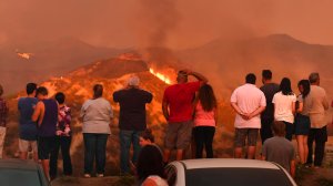 Evacuated residents watch as the Sand fire burns in the San Gabriel Mountains on Sunday. (Credit: Wally Skalij / Los Angeles Times)