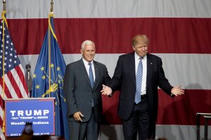 Republican presidential candidate Donald Trump greets Indiana Gov. Mike Pence at the Grand Park Events Center on July 12, 2016 in Westfield, Indiana. (Credit: Aaron P. Bernstein/Getty Images)