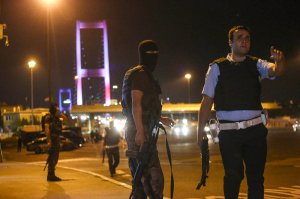 Turkish soldiers block Istanbul's Bosphorus Brigde on July 15, 2016 in Istanbul, Turkey. (Credit: Burak Kara/Getty Images)
