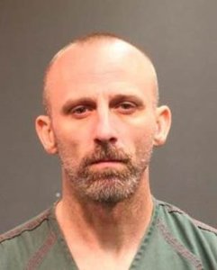 Joseph Raymond Stanton is seen in a booking photo released by the Santa Ana Police Department.