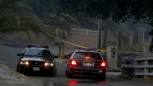 Sheriff's homicide detectives were investigating the death of a man whose body was found in the area burned by the Sand fire in Santa Clarita on Saturday night. (Credit: Francine Orr / Los Angeles Times)