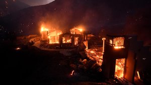 A house burns along Little Tujunga Canyon Road as the Sand Fire rages near Santa Clarita. (Credit: Wally Skalij / Los Angeles Times)