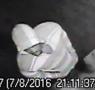 A man sought in connection with a triple shooting is seen in an image provided by the San Bernardino Police Department.