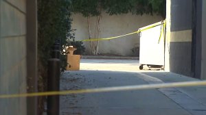 Crime scene tape marks the area where a woman's body was found in West Hollywood on July 6, 2016. (Credit: KTLA)