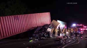 Three big rigs were involved in a crash on the 710 Freeway in Long Beach on Aug. 24, 2016. (Credit: Loudlabs)