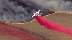 Crews battle the Bogart Fire from the air after the blaze broke out on Aug. 30, 2016. (Credit: KTLA)