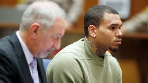 Singer Chris Brown and his attorney, Mark Geragos, attends a progress hearing at Los Angeles Superior Court on January 15, 2015 (Credit: Lucy Nicholson - Pool/Getty Images)