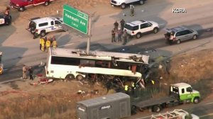 Authorities investigate a fatal bus crash in Merced County on Aug. 2, 2016. (Credit: KCRA via CNN)