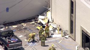 A plane crashed into a building near the Van Nuys Airport on Aug. 2, 2016. (Credit: KTLA) 