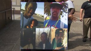 Photos displayed by his family outside the L.A. County Hall of Administration on Aug. 9, 2016, show Donnell Thompson. (Credit: KTLA)