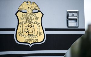 A seal on a door to a Federal Bureau of Investigation mobile command vehicle is seen during an FBI field training exercise May 2, 2014, in Alexandria, Virginia. (Credit: BRENDAN SMIALOWSKI/AFP/Getty Images)