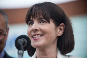 CEO of the Democratic National Committee, Amy Dacey, speaks at a press conference pitching the borough of Brooklyn to host the 2016 Democratic National Convention outside the Barclay Center on Aug. 11, 2014. (Credit: Andrew Burton/Getty Images)