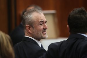 Nick Denton, founder of Gawker, talks with his legal team before Terry Bollea, aka Hulk Hogan, testifies in court during his trial against Gawker Media at the Pinellas County Courthouse on March 8, 2016, in St Petersburg, Florida. (Credit: John Pendygraft-Pool/Getty Images)