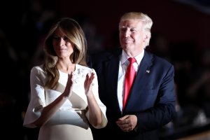 Republican presidential candidate Donald Trump and his wife Melania Trump acknowledge the crowd on the fourth day of the Republican National Convention on July 21, 2016, in Cleveland, Ohio. (Credit: Win McNamee/Getty Images)