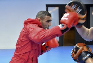 Moroccos's boxer Saada Hassan practices with his coach during a training session at the Riocentro complex in Rio de Janeiro, Brazil on Aug. 1, 2016.(Credit: YURI CORTEZ/AFP/Getty Images)