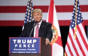 Republican presidential candidate Donald Trump addresses supporters during a campaign rally at Silver Spurs Arena inside the Osceola Heritage Park in Kissimmee, Florida on Au. 11, 2016. (Credit: GREGG NEWTON/AFP/Getty Images)