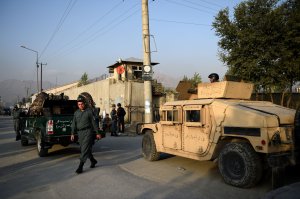 Afghan security personnel keep watch near the site following the militants' raid that targeted the elite American University of Afghanistan, in Kabul on August 25, 2016. (Credit: WAKIL KOHSAR/AFP/Getty Images)