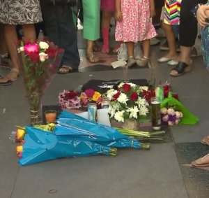Flowers and candles were left at Juan Gabriel's star on the Hollywood Walk of Fame on Aug. 28, 2016. (Credit: KTLA) 