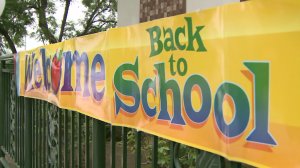 A welcome back to school sign greeted returning students outside an LAUSD school. (Credit: KTLA)